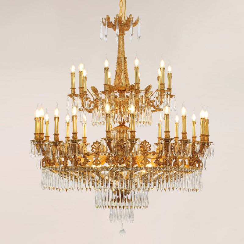 Detailed view of the hand-chased acanthus leaf motifs on a luxury brass chandelier frame.