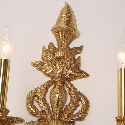 Detailed view of the fabric lampshade wall light with beaded trim and hanging crystal droplet embellishments.