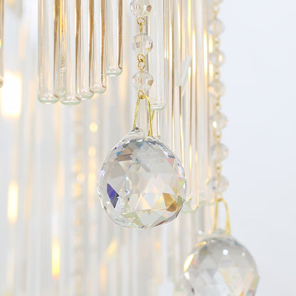 Macro close-up of the finely detailed golden acanthus leaf accents and the precision-cut crystal prisms.