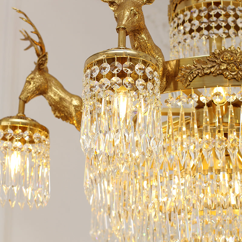 Angled perspective showcasing the grand multi-tiered cascading crystal strands and the ornate central column.