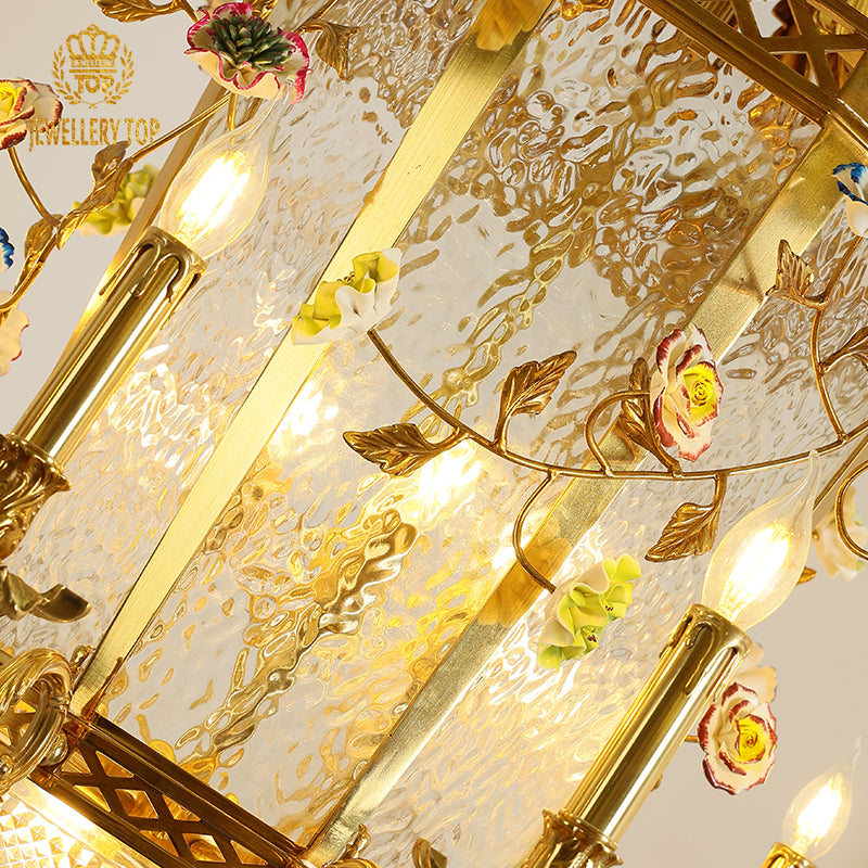 Extreme detail shot focusing on the candle-style flame bulbs and the ornate brass canopy at the top.