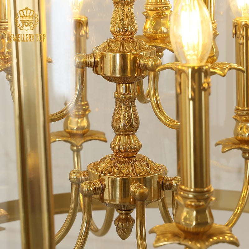 Detailed macro shot of engraved brass column and light bulbs on the lantern pendant light.