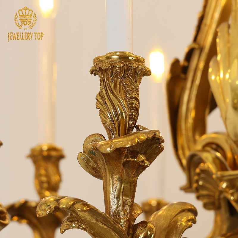 Extreme macro shot of detailed scrollwork and on a luxury hand carving chandelier.