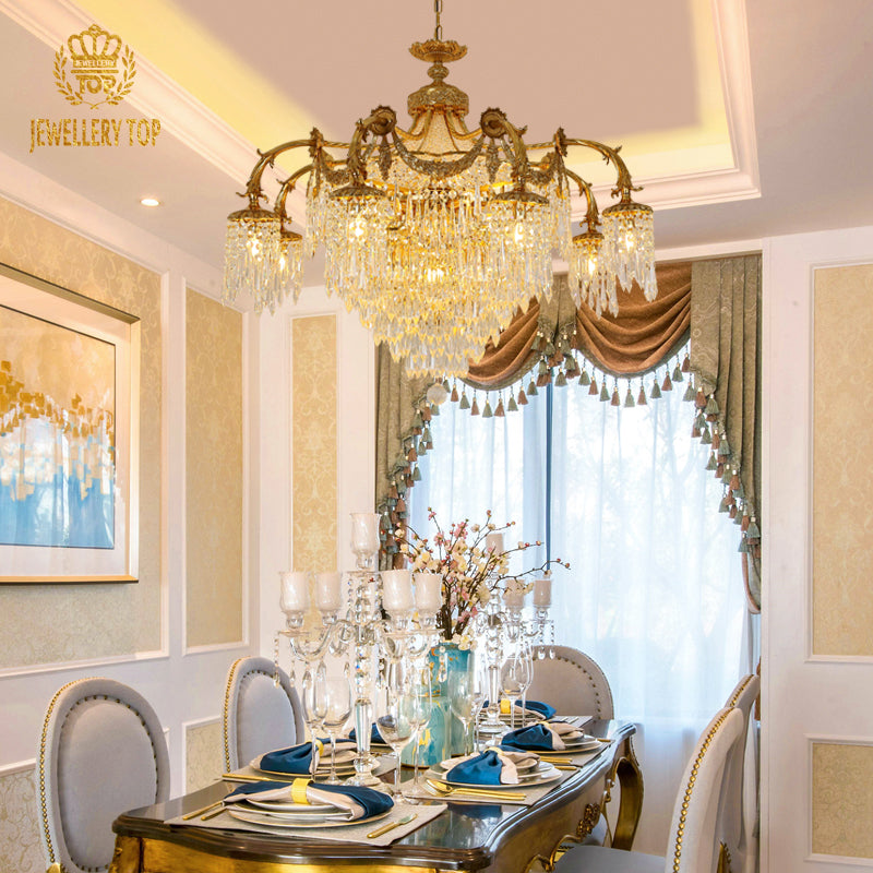 The brass chandelier installed above an elegant dining setting in a classic interior.