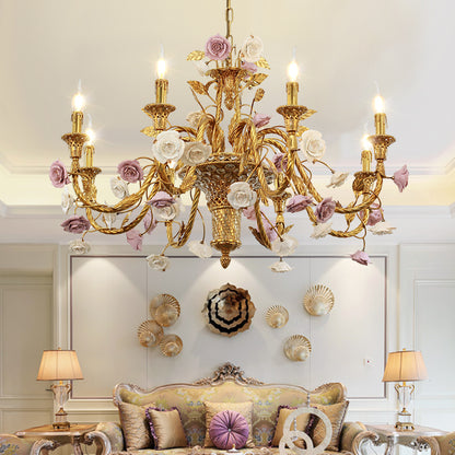 The brass and ceramic chandelier installed in an elegant living room with shell-decorated wall.