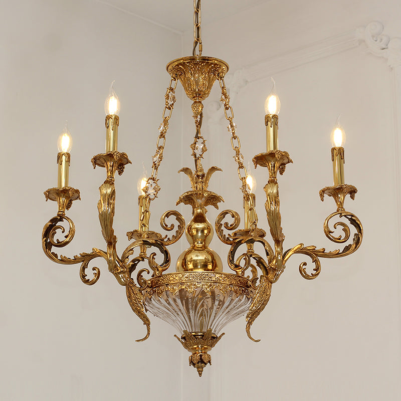 Detailed close-up of the chandelier’s intricate brass scrollwork and shell motifs.