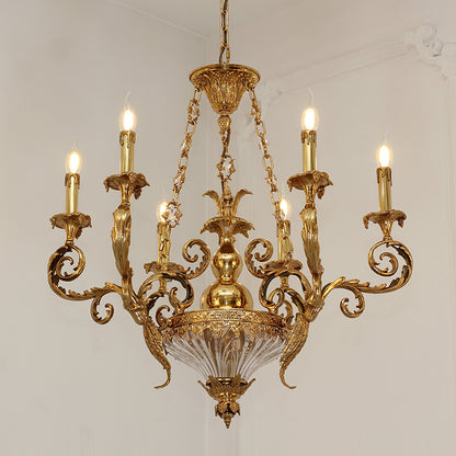 Detailed close-up of the chandelier’s intricate brass scrollwork and shell motifs.