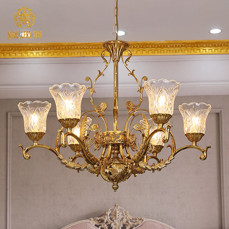 Angled perspective highlighting the symmetrical arrangement of five light sources and the elaborate lower filigree.