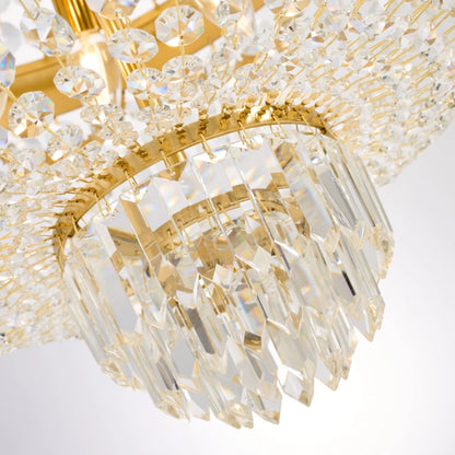 Detailed view of the circular brass frame and cascading crystal strands on a decorative chandelier.