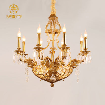 A luxury decorative brass chandelier installed against a white ceiling, showcasing its symmetrical Sun King design.