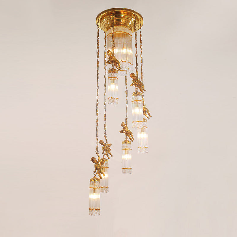 Detailed front view of a brass chandelier with cylindrical glass shades and long chains.