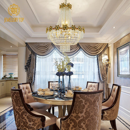 JEWELLERY TOP brand's luxury crystal decorative chandelier showcasing cascading crystal strands and detailed golden floral fixtures.