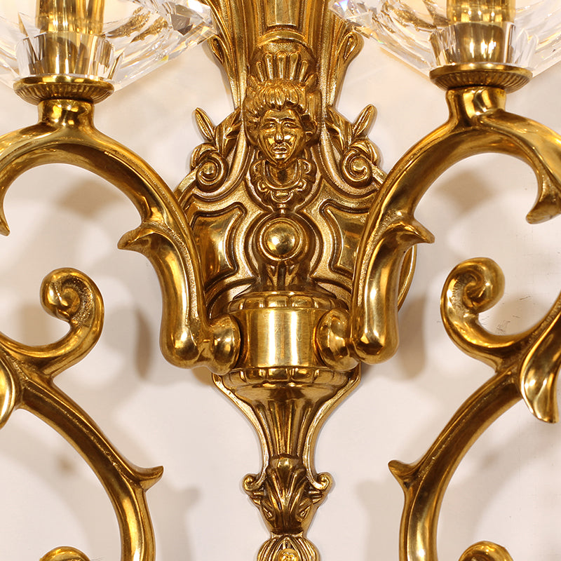 Extreme macro detail of the central classical portrait with a crown, surrounded by intricate scrollwork.