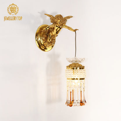 A pair of the golden Cupid wall lamps symmetrically installed on a clean white wall.