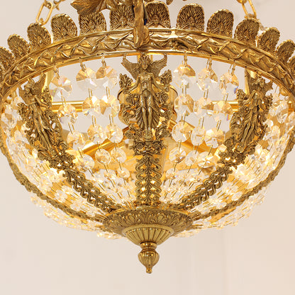 Close-up detail of a brass shell motif, nymph sculpture, and crystal fringe on the chandelier.