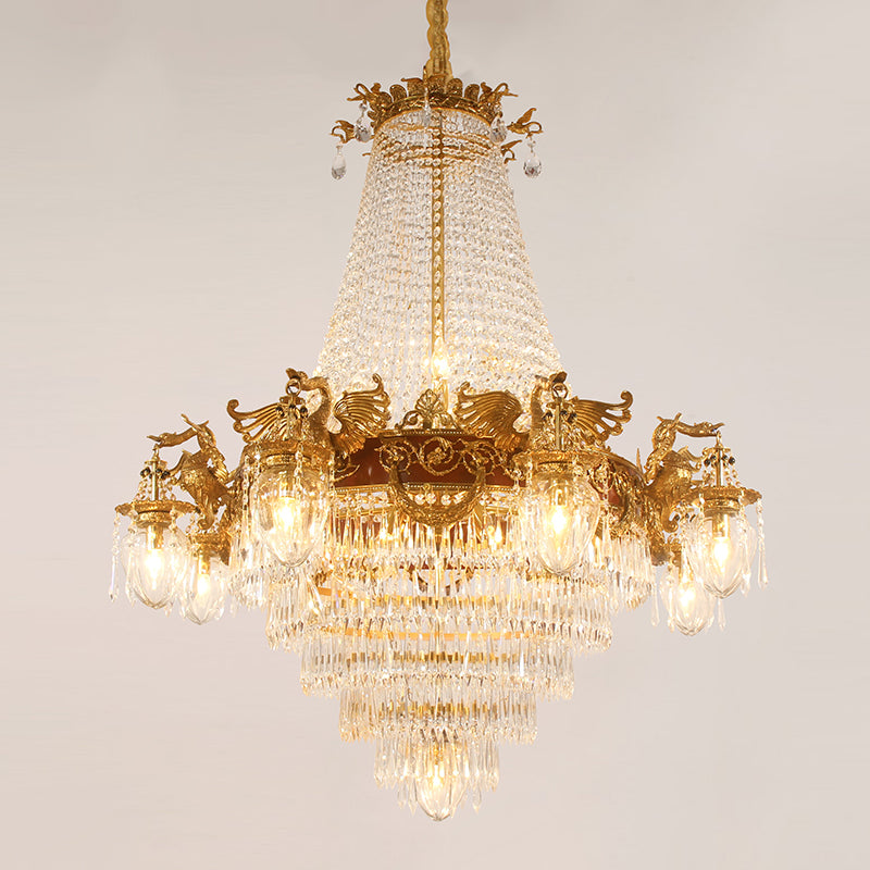 Front perspective of a pyramidal French brass chandelier with multiple lights and crystals.