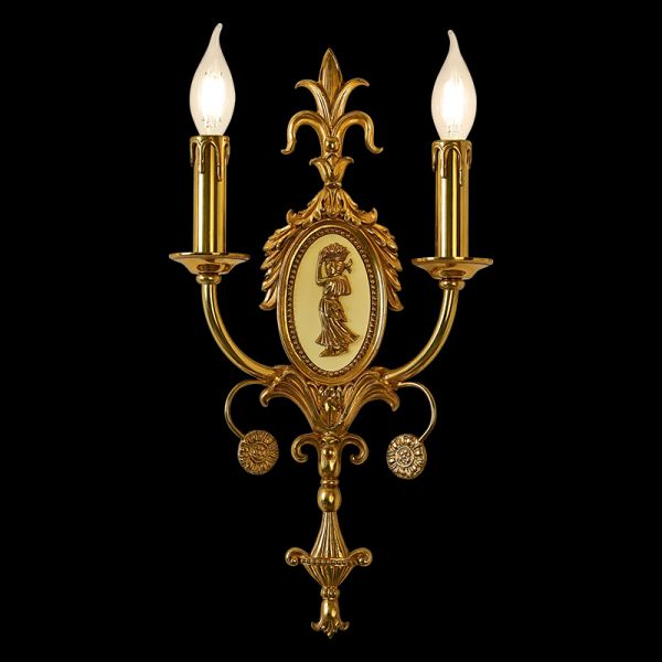 Close-up of the Fleur-de-Lys Candelabra brass wall sconce with oval cameo and iris motif on black, JEWELLERY TOP.