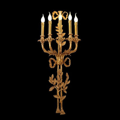 JEWELLERY TOP brand image of the luxury brass wall lamp, showcasing its vertical cascade of lights and intricate details.