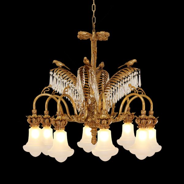 The luxury brass chandelier casting a warm, ambient glow over an elegant seating area.
