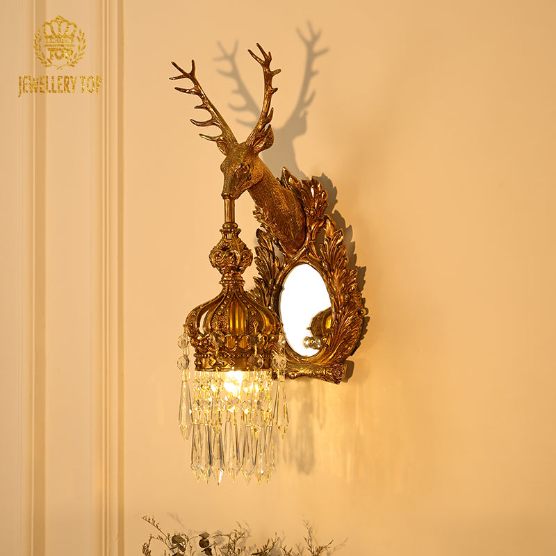 Branded product shot of the golden deer head wall lamp with mirror, isolated on a clean background.
