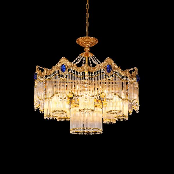 Full studio shot of the French Versailles style sapphire and K9 crystal brass chandelier glowing against a stark black background.