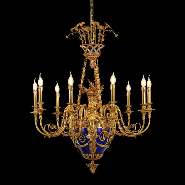 The baroque brass chandelier with candle bulbs and blue centerpiece, isolated on black.