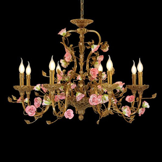 A french ceramic flowers chandelier illuminating a lavishly decorated classic residence with ornate wall moldings.
