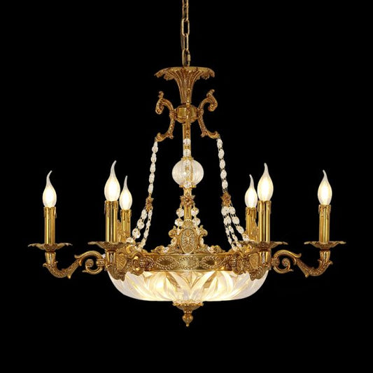 Phare d'Opulence brass chandelier with crystal beads and a glass bowl, on black background.