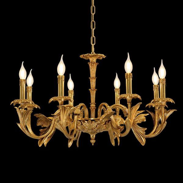 A vintage luxury chandelier showcasing elegant upward-curving arms and intricate foliate carvings.