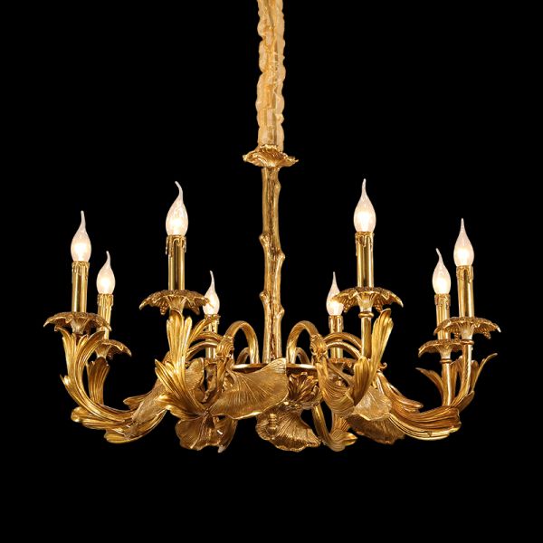 JEWELLERY TOP brand's decorative chandelier featuring detailed brass leaves and candle-style bulbs.