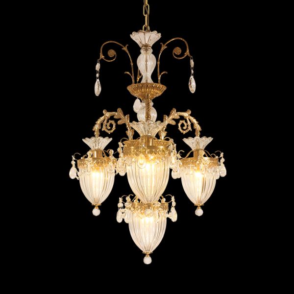 Full view of the Château de Versailles opulence brass chandelier with extensive crystal strands on black background.