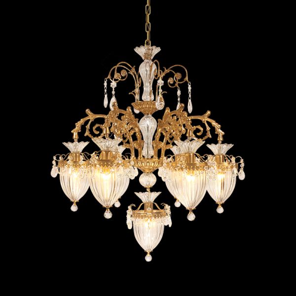 Extreme detail shot of the openwork brass frame and the dense arrangement of hanging crystal prisms.