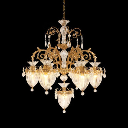 Extreme detail shot of the openwork brass frame and the dense arrangement of hanging crystal prisms.