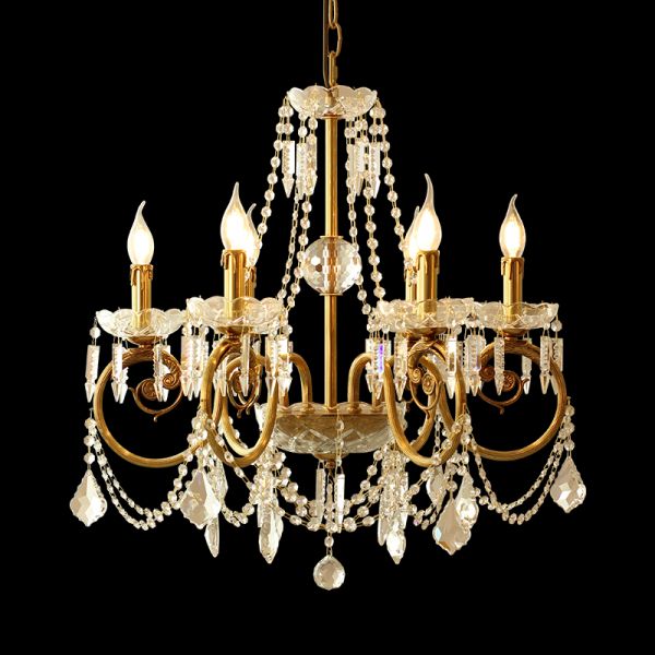 Boudoir de Perles six-arm brass crystal chandelier on a black background, front view.