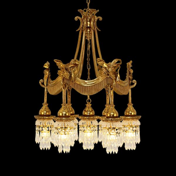 Full studio shot of the French Empire victory goddess wheat brass chandelier glowing against a stark black background.