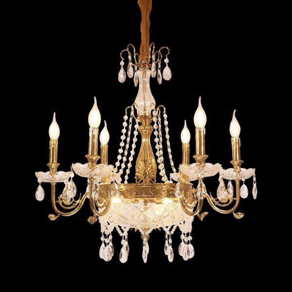 Lumière Éternelle six-arm brass chandelier with crystal chains on black background.