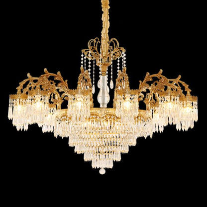 Grand hotel lobby chandelier with white shades and crystal drapes, made of golden brass.