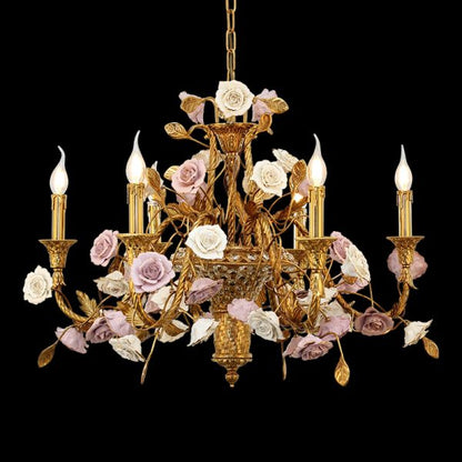 Pompadour Roseraie brass chandelier with ceramic flowers and winding arms on black background.