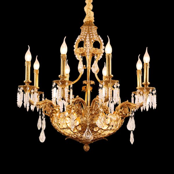 Front view of the Tournesol Radiance classical french brass chandelier with crystal drops on black background.