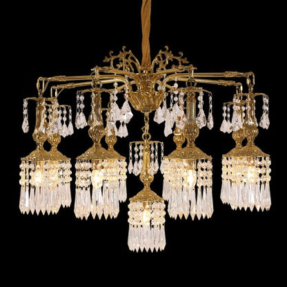 Full studio shot of the French Botanical Opulence gilded brass and crystal branch chandelier glowing against a stark black background.