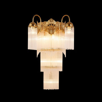 Ballet Lumière Brass Wall Sconce with golden frame and crystal fringe on black background, JEWELLERY TOP.