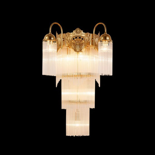 Ballet Lumière Brass Wall Sconce with golden frame and crystal fringe on black background, JEWELLERY TOP.