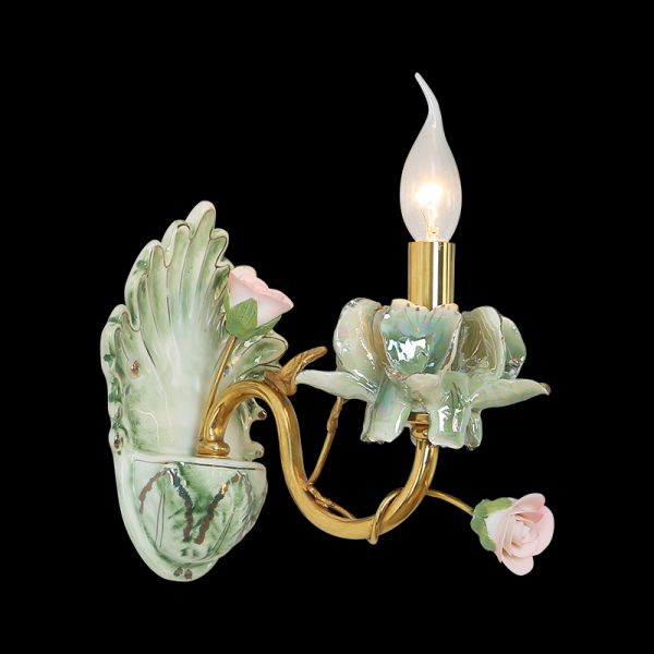 Close-up front view of the JEWELLERY TOP flowers decor wall light, showcasing pink roses and brass details.
