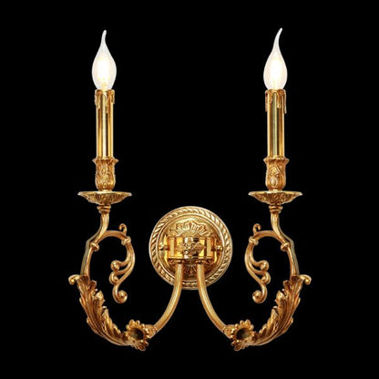 Rococo Rhapsody Brass Wall Sconce with two candle lights and intricate scrollwork on a dark background, brand JEWELLERY TOP.