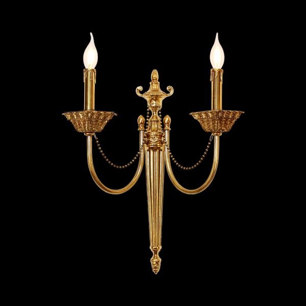 Cygne Royal dual-arm brass wall sconce with candle bulbs and bead chains on black, JEWELLERY TOP.