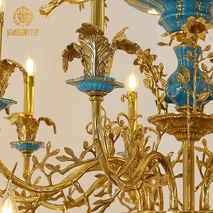 Macro close-up of the finely sculpted gilded flowers and the richly textured turquoise ceramic components.