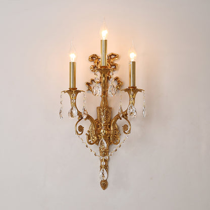 Side profile view of the three-arm wall light, highlighting its elegant proportions and warm glow.