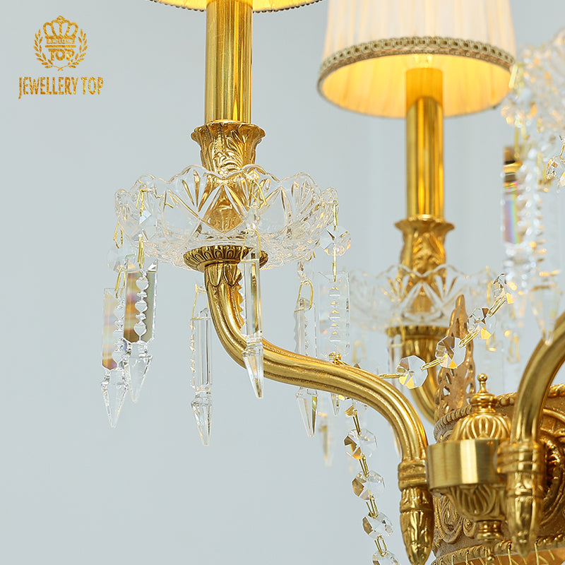 Angled view highlighting the symmetrical arrangement of six lights and the central column of hanging crystals.