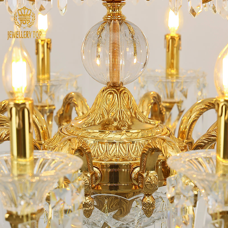 Macro close-up of the finely detailed golden classical scrollwork and the precision-cut K9 crystal pendeloques.