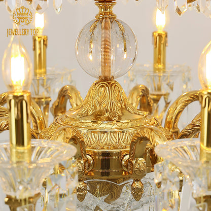 Macro close-up of the finely detailed golden classical scrollwork and the precision-cut K9 crystal pendeloques.